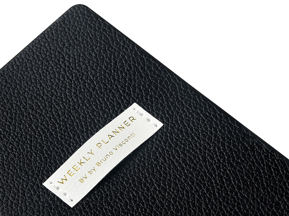 Еженедельник недатированный А6 Black с нашивкой, черный Еженедельник недатированный А6 Black с нашивкой, черный